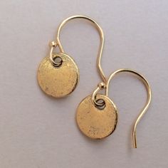 New The Hand Formed 18k Gold Plated Coin Disc Sway Peacefully Under Elegant French Style Ear Wires. Perfect Everyday Earrings. Coins Are 7mm Approx. Total Length Is 0.7”L Handmade In California, Not Associated With Sundance Catalog Bundle Up And Save Even More 10% Fast Shipping I Really Want You To Look At My Other Handcrafted Jewelry Single Gold Earring For Anniversary, Handmade 14k Gold Earrings For Everyday, Everyday Round Brass Jewelry, Everyday Brass Jewelry, Minimalist Recycled Gold Drop Earrings, Everyday Recycled Gold Drop Earrings, Sterling Silver Jewelry With Ear Wire In Gold, Handmade Dainty Jewelry In Recycled Gold, Everyday Gold Recycled Gold Earrings