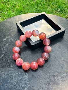 Crimson Agate strengthens your will and is useful when you want to overcome weakness. It fills your heart with energy and increases love luck or home luck. It is good to use when you want to overcome difficulty or an unlucky year. It can help the wearer through crisis. Our bracelets are made with quality gem stones so there will be some variation to each bracelet. Feel free to message us if have any questions. Spiritual Red Agate Bracelets, Red Agate Bracelets For Meditation, Red Round Bracelets For Meditation, Agate Bracelets As A Gift, Round Agate Crystal Bracelet Gift, Round Agate Bracelet Gift, Pokémon Diamond, Pokemon Trading Card, Gem Stones