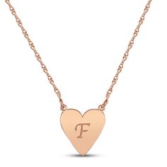 This lovely necklace features a 14K rose gold heart customized with your initial in a sophisticated script font. The pendant suspends from an 18-inch rope chain that secures with a spring ring clasp. Rose Gold Engraved Heart Pendant Name Necklace, Engraved Rose Gold Heart Pendant Name Necklace, Rose Gold Heart Pendant Name Necklace, Rose Gold Heart Pendant Name Necklace For Valentine's Day, Valentine's Day Rose Gold Heart Pendant Name Necklace, Valentine's Day Initials Charm Necklace In Rose Gold, Rose Gold Heart-shaped Name Necklace For Valentine's Day, Valentine's Day Rose Gold Charm Necklaces With Initials, Valentine's Day Rose Gold Initials Charm Necklace