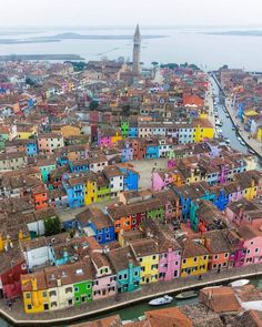 an aerial view of colorful buildings in the city