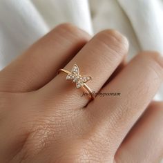 Detail: 925 Sterling Silver CZ Butterfly Ring, Dainty Pave CZ  Butterfly Ring, Diamond Butterfly Ring, CZ Butterfly lovers Ring,Butterfly Ring 💜Item Name: diamond butterfly ring  💜Metal : 925 sterling silver  💜Gemstone:cubic zirconia 💜Ring Size : All Standrd ring size available Custom Option:  Yes 💜jewellrybypoonam💜 This exquisite 14k yellow gold moissanite diamond ring is the perfect symbol of your love and comtmitment. Designed with a timeless elegance, this ring is sure to take her brea Fine Jewelry Cubic Zirconia Butterfly Ring For Anniversary, Diamond White Cubic Zirconia Butterfly Ring For Anniversary, Fine Jewelry Cubic Zirconia Butterfly Ring, Cubic Zirconia Butterfly Ring As Gift, Dainty Cubic Zirconia Rings For Gift, Rose Gold Cubic Zirconia Butterfly Ring For Anniversary, Fine Jewelry Stackable Sparkling Rings, Dainty Cubic Zirconia Rings As Gifts, Fine Jewelry Sparkling Stackable Rings As Gift