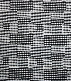 black and white checkered fabric with small squares in the center, as if it were woven