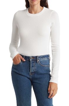 Refresh your essentials with this long-sleeve crop top cut from a stretchy ribbed knit. 18 1/2" length Crewneck Long sleeves 97% polyester, 3% spandex Machine wash, tumble dry Made in the USA Model stats: 5'10" height, 32" bust, 25" waist, 36" hip. Model is wearing size Small. Stretch Long Sleeve Cropped Sweater With Ribbed Neckline, Stretch Cropped Sweater With Ribbed Neckline And Long Sleeves, Stretch Ribbed Cropped Sweater With Crew Neck, Stretch Knit Cropped Sweater With Ribbed Detail, Trendy Ribbed Long Sleeve Top For Spring, Stretch Ribbed Long Sleeve Cropped Sweater, Fitted White Cropped Sweater With Ribbed Cuffs, Stretch Cropped Sweater With Ribbed Neckline For Spring, Chic Ribbed Stretch Cropped Sweater