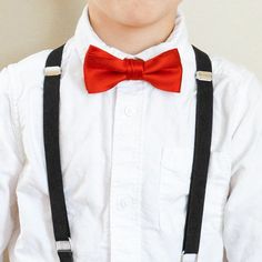 He’ll be ready for the dressiest of occasions with these black suspenders. These youth-sized suspenders are classic but stylish thanks to the skinny, half-inch straps. There’s no tie included, but the possibilities are endless. Go for a timeless look with a black bow tie or add some color with a boys’ floral bow tie. Don’t worry about these suspenders slipping off, they're easy to wear and to adjust. Three metal clips attach to his pants. (One goes in the back and two in the front, just over the Classic Fitted Belts And Suspenders With Adjustable Straps, Classic Formal Adjustable Belts And Suspenders, Classic Bow Tie With Suspenders For Party, Classic Adjustable Belts And Suspenders For Party, Classic Party Bow Tie With Suspenders, Classic Black Belts And Suspenders For Black Tie, Classic Black Belts And Suspenders For Party, Classic Adjustable Belts And Suspenders With Bow Tie Back, Classic Formal Belts And Suspenders With Ties