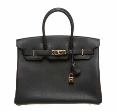 Bag: Hermès Birkin Bag Size: 35cmColor: Noir (Black)Material: Togo Leather Hardware: GoldMeasures: 35x28x18cm (14"x11"x7")Condition : Pristine Includes: Lock, Keys, Clochette, Dustbag, Felt, Raincoat and Orignal Hermès Box with Ribbon Get your hands on this amazing Hermès Birkin and experience what designer handbags are like at their best. This bag is made from exquisite Togo leather and is accentuated with luxurious gold hardware. The beautiful black color makes it easy for you to coordinate th Hermes Birkin 35, Box With Ribbon, Hermes Box, Togo Leather, Hermes Bags, Black Bag, Rarity, Hermes Birkin, Birkin Bag