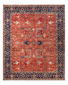 an orange, blue and red rug with many different designs on the border is shown