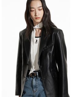 This is a comfortable and casual jacket that is made out of high quality vegan leather fabric. With a unique design with two button breast closure and shoulder padding, it is comfortable to wear in a daily life. - Padded shoulder detail- Vegan leather with minimal wrinkles- Single two button breast closure Trendy Leather Jacket With Lapel Collar, Leather Blazer With Snap Buttons For Office, Chic Leather Blazer With Snap Buttons, Office Leather Blazer With Snap Buttons, Chic Single Breasted Leather Jacket With Lapel Collar, Chic Single-breasted Leather Jacket With Lapel Collar, Single Breasted Biker Jacket For Work And Fall, Single-breasted Biker Jacket For Spring Workwear, Trendy Leather Jacket With Lapel Collar For Work