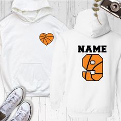 Heart Basketball Team Hoodie, Custom Name and Number Game Day Sweatshirt, Personalized Basketball Lover Mom Shirt, Basketball Dad Shirt Show your love for the game with our Heart Basketball and Basketball Team Hoodie, perfect for game day! This cozy sweatshirt features a custom name and number, making it an ideal Personalized Basketball Mom Shirt or Basketball Dad Shirt. Whether you're cheering from the stands or supporting your favorite player, this Game Day Sweatshirt will showcase your team s Basketball Shirts For Girlfriends, Heart Basketball, Game Day Sweatshirt, Basketball Mom Shirts, Number Game, Personalized Basketball, Custom Basketball, Basketball Mom, Number Games