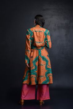 This Trench that is crafted from high quality & comfortable linen. It featuring a beautiful digital print and highlight of adda embroidery on trench, Feel confident & stylish in this choice of fabric and unique design make it a perfect garment for any occasion.*Note: Slight differences in the colour of the print is a very common occurring as each batch of fabric printed can never be precisely replicated. Variations in the placement of the print may occur due to the size of the print and fabric - The Colour, Feel Confident, Custom Sizing, Make It, Unique Design, Printing On Fabric, Unique Designs, Digital Prints, Embroidery