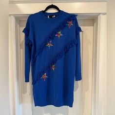 Love Moschino Sweater Dress. New With All Tags. Sized 40. Details Knitted, Sequins, Logo, Lam, Lightweight Knit, Round Collar, Solid Colour With Appliqus, Long Sleeves, No Pockets. There Are A Couple Small Snags On The Front Right Shown In Photos. Blue Cotton Long Sleeve Mini Dress, Blue Long Sleeve Cotton Mini Dress, Blue Ruffled Winter Dress, Blue Winter Dresses With Ruffles, Blue Ruffled Dresses For Winter, Blue Crew Neck Mini Dress For Spring, Blue Crew Neck Winter Dress, Blue Cotton Mini Dress For Fall, Blue Cotton Crew Neck Dress