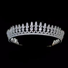 CZ%20Bridal%20and%20Quince%20Tiara%0D%0AThis%20dazzling%20cz%20tiara%20will%20add%20a%20regal%20look%20to%20your%20wedding%20or%20quinceanera%20day%20ensemble.%20This%20glamorous%20headpiece%20features%20high%20quality%20marquise%20and%20round%20cz%26nbsp%3Bcrystals%20in%20a%20silver%20plated%20vintage%20inspired%20design.%0D%0AColor%3A%20Silver%2FClear.%0D%0AStyle%3A%20hp7677.%0D%0ASize%3A%20Design%20is%20about%26nbsp%3B%201%201%2F4%22%20tall.%0D%0APlease%20allow%202-3%20weeks%20for%20delivery.%0D%0AShipping%20Policy.%0D%0AReturn%20Policy%0D%0A%26nbsp%3B%0D%0A%26nbsp%3B%0D%0A%26nbsp%3B Quinceanera Tiaras, Prom Tiaras, Vintage Tiara, Silver Head Piece, Chic Headband, Crystal Bridal Tiaras, Silver Tiara, Crystal Tiara, Beautiful Tiaras