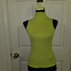 #910b Nwot Michael Stars Bright Green Sleeveless Turtleneck Mercerized Cotton Blend, Stretch, Size On Label: 1 Size Fits Most. Not Lined. Obo! All My Items Are From Smoke & Other Smells Free Environment Measurements And Details Are In The Pictures. All Reasonable Offers Will Be Considered. Contents And Details As Pictured. All Measurements Are Approximate And In Inches, Described To The Best Of My Abilities. No Returns. Dummy: Bust 34.25" Waist 26" Hips 35.25" 23" Long. Green Stretch Tank Vest, Green Stretch Vest, Green Stretch High Neck Top, Green Fitted Summer Vest, Green Stretch Sleeveless Tank Top, Yellow Stretch Vest, Fitted Green Vest Top, Green Fitted Sleeveless Tank Top, Green Stretch Sleeveless Blouse