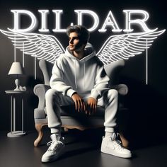 a man sitting on top of a chair in front of a neon sign that reads dildar