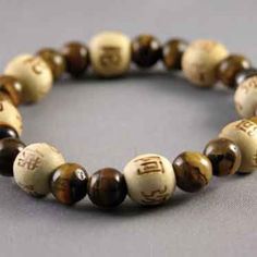 **Brand New** Zorbitz Karmalogy Lucky Karma Bead Bracelet Unisex Protections/Balance Tiger's Eye Brown Beige Lucky Gemstones And Karma Beads Combine Into Jewelry That Looks Great And Can Give You Good Luck And Good Karma. Loved By Both Men And Women Of All Ages. Makes A Perfect Gift For Anyone! Any Props In The Photos Including Shoe Trees And Stands Are Not Included In The Purchase. Please Ask Any Questions Before Purchasing. I Strive To Describe My Items To The Best Of My Knowledge. Item Ships Holistic Wooden Beads Bracelets For Meditation, Spiritual Wooden Beaded Healing Bracelets, Spiritual Stretch Bracelet With Wooden Beads For Meditation, Spiritual Wooden Beads Stretch Bracelet For Meditation, Bohemian Wooden Beads Stretch Bracelet For Meditation, Symbolic Beaded Bracelets With 8mm Beads, Adjustable Stretch Bracelet With Wooden Beads For Meditation, Spiritual Wooden Beads Stretch Bracelet For Healing, Adjustable Wooden Beads Stretch Bracelet For Meditation