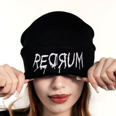 Introducing the Redrum Beanie, a high-quality unisex black acrylic beanie that's both durable and comfortable. Featuring an intricate embroidery design, this beanie is a true statement piece, perfect for adding a bold touch to any outfit. Enjoy lasting comfort and standout style with this exceptional accessory. Punk Style Adjustable Beanie Hat, Adjustable Punk Beanie Hat, Streetwear Beanie With Letter Print, Hip Hop Beanie For Winter Streetwear, Hip Hop Beanie For Streetwear In Winter, Trendy Streetwear Beanie One Size Fits Most, Alternative Beanie For Streetwear, Letter Print Beanie For Streetwear, One Size Beanie For Streetwear