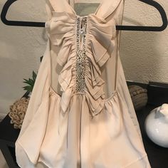 Beautiful Cream Color Sleeveless Blouse From Buckle. Never Worn. Flawless. Gorgeous Beading On Back W Rhinestone Buttons. Super Cute. Sleeveless Blouse, On Back, Cream Color, Beading, Top Blouse, Super Cute, Buckle, Womens Tops, Cream