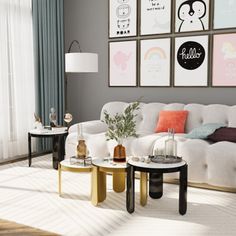 a living room filled with furniture and pictures on the wall above it's coffee table