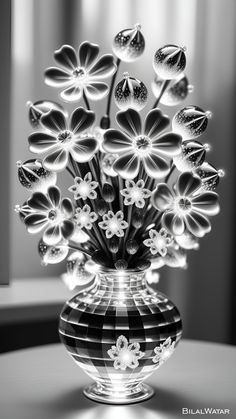 black and white photograph of flowers in a vase