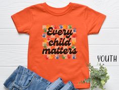 Support Indigenous awareness with our Every Child Matters shirt, designed to honor Orange Shirt Day 2024 and promote Truth and Reconciliation. A portion of every purchase of tgis September 30th Tshirt goes directly to Indigenous First Nations causes, making this tee not just a statement, but a contribution.   Please review all photos for respective size charts. How to Order: 1. Review all photos. 2. Choose your size from the drop-down menu. 3.Add to cart and repeat for additional items. PROCESSI Cotton Graphic Print Shirt For Awareness Events, Cotton Shirt With Graphic Print For Awareness Events, Graphic Print Tops For Awareness Events, Cotton Tops With Letter Print For Awareness Events, Truth And Reconciliation, Orange Shirt Day, Every Child Matters, Orange Shirt, First Nations