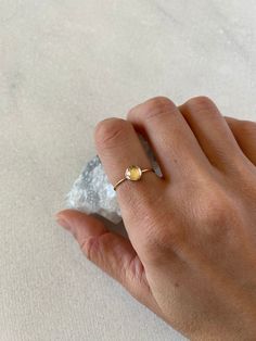 Natural rose cut 6mm crystal quartz takes a center stage in this delicate and minimal ring. Available in sterling silver, gold filled and solid 14k gold. The crystal is clear and faceted (rose cut). Solid gold sales are final. Thank you! * Featured ring-1mm gold filled, size 7 Dainty 14k Gold-filled Stackable Promise Rings, Simple 14k Gold-filled Rings For Anniversary, Simple 14k Gold Filled Rings For Anniversary, Simple 14k Gold-filled Anniversary Rings, Gold Dainty Crystal Ring In Sterling Silver, Stackable Yellow Gold Crystal Ring For Everyday, Dainty Gold Crystal Ring In Sterling Silver, Simple 14k Gold Filled Midi Rings For Anniversary, Simple 14k Gold Filled Rings As Gift