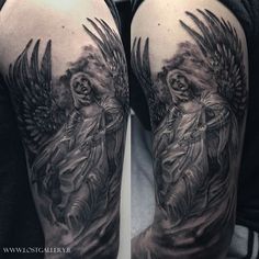 a man's arm with an angel tattoo on it