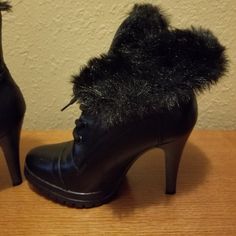 Never Worn Black Short Leather Boot With Soft Black Plush Inside. Can Be Worn 2 Ways, With Top Of Boot Folded Over To Expose Plush Or Straight Up. Winter Ankle-high Heeled Boots With 4-inch Heel, Winter Closed Toe Heeled Boots With 4-inch Heel, Fitted Lace-up Winter Booties, Winter Heeled Boots With 4-inch Heel, Closed Toe, Winter Boots With 4-inch Heel, Lace-up Winter Booties, Black Lace-up Booties, Fitted Leather Winter Booties, Winter Lace-up Fitted Booties