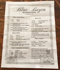 a menu for blue bayou restaurant on a wooden table with the instructions printed in black and white