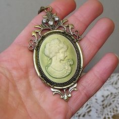 Amazing vintage Victorian cameo necklace with long brass chain.In very good vintage condition.Great gift for vintage-loving women.All pictures are real you get exactly the subject from the photos and everything I suggest is authentic without imitations.Enjoy :)Measures- chain-13" long or 36cmCameo-3"x1,5" or 8x4cmI send worldwide with priority airmail and tracking number.Please contact me for combined Shipping.Look more beautiful Vintage items from my store here;http://www.etsy.com/shop/ANTIQUEc Luxury Cameo Pendant Necklace, Cameo Necklace Gold, Vintage Cameo Necklace In Antique Gold, Vintage Antique Gold Cameo Necklace, Vintage Necklace With Antique Finish As Gift, Vintage Antique Finish Necklace As Gift, Vintage Antique Finish Necklace For Gift, Vintage Cameo Necklace For Vintage Events, Vintage Cameo Necklaces For Vintage Events