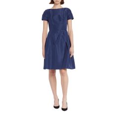 Carolina Herrera cocktail dress in taffeta. Approx. length:  40" from shoulder to hem. Bateau neckline. Short sleeves. Princess seams. Fit-and-flare silhouette. Hem hits about at the knee. Zips at v back. Silk. Lining, polyester/spandex. Dry clean only. Made in USA. Satin A-line Dress With Box Pleat, Silk A-line Dress With Pleated Bodice, Evening Satin Midi Dress With Pleated Waist, Fitted Knee-length Evening Dress With Pleated Bodice, Elegant Taffeta Mini Dress, Formal Fitted Taffeta Mini Dress, Fitted Taffeta Mini Dress For Formal Occasions, Silk A-line Evening Dress With Pleated Back, Cocktail Silk Evening Dress With Pleated Back