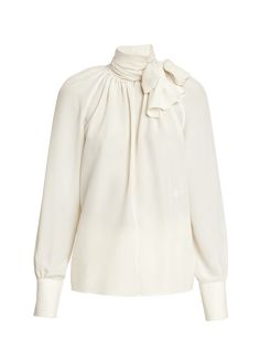 Find GIVENCHY Embroidered 4g Long-sleeve Tie-neck Silk Blouse on Editorialist. Givenchy semi-sheer blouse accented with a self-tie neckline and tonal front 4G embroidery High neckline Long sleeves; button cuffs Hip length Relaxed fit Silk Made in Italy Luxury Long Sleeve Tops For Wedding, Designer Tie Neck Blouse, Luxury Long Sleeve Blouse For Wedding, Luxury Long Sleeve Wedding Blouse, Designer Tops For Spring Wedding, Designer Spring Wedding Tops, Designer Silk Blouse For Fall, Designer Silk Tops For Fall, Designer Long Sleeve Blouse For Wedding