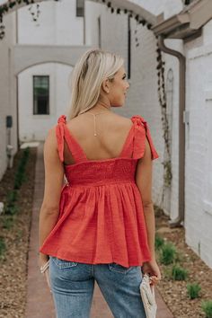 Add a pop of color to your wardrobe with our adorable tangerine hued 'Porch Swing Sippin' Tank' featuring lightweight material with horizontal embroidered stripes across the bodice, a square neckline and upper back with smocked detailing, wide sleeveless tie closure shoulder straps, and a flattering flared silhouette that falls into a straight hemline! Summer Square Neck Top With Tie Back, Red Square Neck Top For Spring, Summer Tops With Smocked Back And Square Neck, Square Neck Smocked Back Summer Top, Red Casual Tie Back Top, Square Neck Tops With Smocked Back For Summer, Casual Square Neck Top With Tie Back, Red Square Neck Top For Summer, Cotton Top With Square Neck And Smocked Back