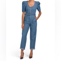 New Jessica Simpson Blue Denim Jumpsuit With Pleated Puff Sleeves. Jumpsuit Has A Belted Waist, Button Bodice, And Front Zip Closure. Jumpsuit Has Leg Cuffs That Are Designed To Be Cuffed Or Worn Full Length. Jumper Has A Nice Rounded Neckline And Two Front Hip Pockets. 100% Cotton Medium Wash Jumpsuits And Rompers With Buttons For Work, Fitted Medium Wash Denim Jumpsuit For Work, Medium Wash High Waist Denim Jumpsuit For Work, Medium Wash Jumpsuits With Buttons For Workwear, Fitted Denim Overalls For Workwear, High Waist Medium Wash Overalls For Workwear, High-waisted Cotton Denim Jumpsuit For Work, Denim Blue Workwear Jumpsuits And Rompers With Button Closure, Fitted Denim Blue Jumpsuit For Work