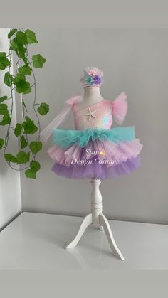 Hello☺️Our dresses are handmade products.Personalized design is available🌸you can let me know by sending a message.Our dresses use cotton lining and have a hidden zipper at the back.Dense layers of tulle are used on the skirts of our dresses and they are fluffy dresses,A hair accessory is also sent as a gift along with the dress🎁We deliver your order within 4 business days with fast shipping💖Thank you for choosing us and we wish you pleasant shopping.⭐️⭐️⭐️⭐️⭐️ Pink Fairy Style Pageant Dress, Tulle Mermaid Dress With Ruffles For Pageant, Tulle Mermaid Dress With Ruffles, Whimsical Fitted Princess Dress In Mermaid Style, Fitted Mermaid Princess Dress For Birthday, Pink Mermaid Dress For Wedding, Princess Style Mermaid Tulle Dress With Ruffles, Princess Sleeveless Mermaid Dress With Ruffles, Princess Style Sleeveless Mermaid Dress With Ruffles