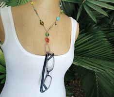 EYEGLASSES CHAIN  Mother's Day Gifts for Mom Graduation Gifts for Her 2023 Birthday Gifts for Women EYEGLASS HOLDER NECKLACE * Glass and stone beads * Stainless steel chain * Silver-plated loop holder * Unique statement necklaces with a vintage boho vibe * Length:  24" + optional extender (the drop with skull is about 3.5") * Glasses are not included  Keep your eyeglasses and sunglasses, nearby & safe, by clipping them onto this eyeglass chain. (Without the glasses, it's a fun piece of jewelry!) Eyeglass Holder Necklace, 2023 Birthday, Eyeglasses Holder Necklace, Eyeglasses Chain, Unique Statement Necklace, Eyeglass Necklace, Gift For Best Friend, Graduation Gifts For Her, Eyeglass Chain