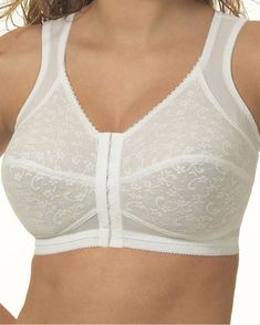 Easy to wear, comfortable and feminine, this Wireless Front-Closure Back-Support Bandeau Bra has soft cups, pretty lace and an easy front closure. The wide shoulder straps provide support and less tension. • Wireless Front-Closure Back-Support Bandeau Bra. • Lightly padded, soft-shaped cups. • Easy, secure front closure. • Comfortable wide shoulder straps. • Back crisscross bands for better posture and back/shoulder support. • Shaping side supports keep garment in place. • 65% nylon, 25% polyest Posture Bra, Shoulder Support, Minimiser Bra, Bandeau Bra, Better Posture, Soft Cup Bra, Plus Size Bra, Cup Bra, Back Support