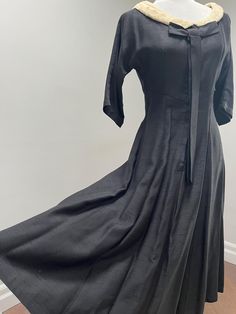 1960s black dress in a slubbed satin back fabric.  Fitted throughout top and flares at the waist and into the skirt.  Wool collar. Full zip front Removable front bow Black Flare Dress, Skirt Wool, Flared Dress, Black Flare, Wedding Shop, Favorite Things Gift, Flare Dress, Labour Day, Beauty Book