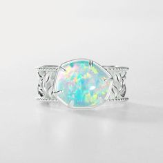 This marvelous Silver Opal Ring is as stunning as it is unique. Made from the finest silver and featuring a shimmering opal stone, it will add a touch of magic to any outfit. Perfect for the whimsical and playful soul. DETAILS Materials: 925 Sterling Silver, Synthetic Opal Size: Adjustable, 0.47"*0.67"(12mm*17mm) Weight: 4.2 g What’s my ring size? Fruit Necklace, Everyday Wear Jewelry, Astrology Jewelry, Astrology Necklace, Animal Bracelet, Moon And Star Ring, Silver Opal Ring, Moon And Star Earrings, Nature Earrings