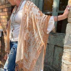 This luxe sheer kimono features a stunning velvet floral print design and fringe hem. Fit: Relaxed and oversized Features: Open-front design, armholes, side slits, sheer fabrication, velvet floral print, fringe hem Why We <3 It: Pair this kimono with a basic tank to instantly elevate any look. Care/Import Hand Wash Warm Import Measurements for size One Size Length: 50 in Sleeve Length: 20 in Velvet Fringe Kimono, Velvet Fringe, Fringe Kimono, Sheer Kimono, Burnout Velvet, Floral Print Design, Front Design, Basic Tank, Front Open