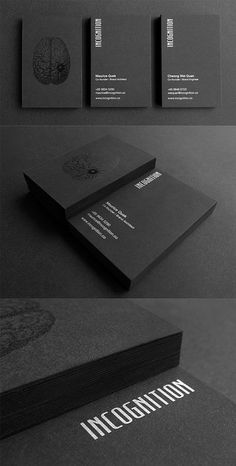 some black and white business cards with the words incomption written on one side