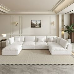 a large white couch sitting in a living room