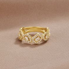 Complete any look with this beautifully crafted ring. Designed bring sparkle and shine to your finger, these rings are perfect for any occasion. 18K gold plated, copper AAA cubic zirconia crystal Hypoallergenic, lead & nickel free US/Canada Ring Size UK/AU Ring Size Inside Diameter (mm) 6 L 16.6mm 7 N 17.2mm 8 P 18.1mm If you aren't in LOVE with your purchase, please let us know within 30 days of receiving your item, and you'll receive a stress-free refund. TRANSLATE with x English Arabic Hebrew Gold Ring With Sparkling Stones For Formal Occasions, Gold Plated Rings With Diamond Accents, Gold Diamond Ring With Sparkling Stones, Gold Diamond Ring With Sparkling Stones For Promise, Gold Crystal Ring With Cubic Zirconia, Formal Gold Ring With Sparkling Stones, Formal Gold Rings With Sparkling Stones, Gold Promise Ring With Sparkling Stones, Gold Diamond Promise Ring With Sparkling Stones