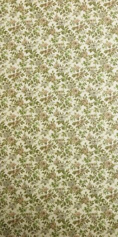 an old fashioned wallpaper with green and brown flowers