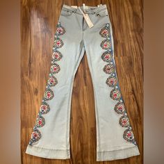 Brand New With Tags, Perfect Condition. Light Acid Washed. High Wasted. Bohemian Embellished Fitted Bottoms, Bohemian Fitted Embellished Bottoms, Embellished Fitted Bohemian Bottoms, Bohemian Bottoms With Multicolor Floral Embroidery, Bohemian Embellished Bottoms For Festival, Red Embroidered Bohemian Bottoms, Festive Bohemian Embroidered Bottoms, Alice Olivia, High Jeans