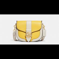 Refined Pebble Leather And Smooth Leather Inside Multifunction Pockets Snap Closure, Fabric Lining Outside Open Pocket Detachable Strap With 20 3/4" Drop For Shoulder Or Crossbody Wear 8 1/4" (L) X 6 3/4" (H) X 2 3/4" (W) Modern Yellow Bags With Gold-tone Hardware, Yellow Coach Shoulder Bag With Gold-tone Hardware, Coach Yellow Shoulder Bag With Gold-tone Hardware, Yellow Coach Satchel Shoulder Bag, Yellow Coach Shoulder Bag, Yellow Coach Bag With Gold-tone Hardware, Coach Yellow Satchel Shoulder Bag, Coach Yellow Bag With Gold-tone Hardware, Coach Yellow Bag With Adjustable Strap