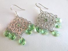 "Chandelier earrings, peridot earrings Gorgeous earrings featuring silver filigrees pairing with Swarovski peridot beads, they completed on quality silver earwires. EARRINGS measure 2\" Earrings Collection https://www.etsy.com/shop/minieglamstudio?section_id=7077498 ♥Free gift wrapping is available upon request, please leave me a message to seller at the check out. Thanks for stopping by! If you need custom order, feel free to contact Minie Glam Studio. Have a nice day" Green Ornate Filigree Earrings, Green Teardrop Chandelier Earrings Nickel Free, Ornate Green Filigree Earrings, Green Teardrop Nickel-free Chandelier Earrings, Green Chandelier Earrings As Gift, Green Dangle Jewelry With Bead Caps, Green Filigree Dangle Jewelry, Green Filigree Drop Earrings, Green Filigree Teardrop Earrings