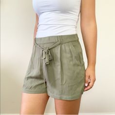 'Campo' Twill Tie Front Shorts By Becool. Elastic Waist. Front Pockets. Size Large In Sage Green New With Tags Length: 15" Waist Across Before Stretch: 15.25" Inseam: 3" 100% Rayon Boutique Spring Summer Fall Birthday Party Celebration Honeymoon Anniversary Shower Casual Weekend Travel Vacation Beach Dinner Date Night Work School City Fashion Summer Bottoms With Elastic Waistband In Khaki, Casual Tie Waist Shorts For Spring, Khaki Summer Bottoms With Short Inseam, Summer Khaki Bottoms With Short Inseam, Summer Bottoms With Tie Waist, Khaki Summer Shorts With Short Inseam, Khaki Bottoms With Short Inseam For Summer, Summer Shorts With Tie Waist, Summer Paperbag Waist Bottoms With Tie