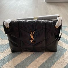 This Bag Is Brand New With Original Packaging And Dust Bag. I Did Not Want To Remove The Packaging, So I’ve Included Photos Of The Bag From The Ysl Website For Reference. 13"W X 9"H X 4"D. 10" Strap Drop; 18" Shoulder Strap Drop. I Originally Paid $2,500 For This Bag (Including Tax) And I Am Just Looking To Recoup My Original Investment, So The $3,125 Price Is Firm. This Bag Currently Retails For $3,550 Plus Tax. Ysl Puffer, Saint Laurent Bags, Yves Saint Laurent Bags, Chain Bag, Chain Bags, The 3, Yves Saint Laurent, Investment, Saint Laurent