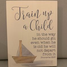 a wooden sign that says train up a child in the way he should go even when he is old he will not depart from it