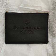 Kate Spade Ash Street Gia Leather Zip Pouch. Color: Black. Size 7.25"H X 10.25"W X 0.5"D. Material: Soft Leather. Front Embossed Signature Logo. Zip Top Pouch Clutch In Leather. Brand New And Never Used. No Dust Bag. Has Tags. Elegant Pouch With Interior Card Slots For On-the-go, Black Clutch With Zipper Pouch For Travel, Black Leather Clutch For Everyday Use, Black Zipper Pouch Clutch For Travel, Black Leather Clutch With Zipper Pouch, Black Leather Pouch Clutch, Black Leather Handheld Pouch, Everyday Black Clutch With Zipper Pouch, Black Clutch With Zipper Pouch For Everyday Use