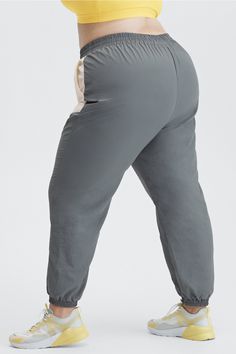 Kickback Two-Tone Track Pant Fabletics Storm Cloud Multi female Activewear >> Womens >> Bottoms >> Pants & Joggers >> Joggers plus Sporty style with elastic waistband Sporty Workout Bottoms With Elastic Cuffs, Stretch Workout Pants With Elastic Cuffs, Nylon Bottoms With Elastic Waistband For Yoga, Sporty Stretch Bottoms With Elastic Cuffs, Stretch Sports Bottoms With Elastic Cuffs, Gym Bottoms With Elastic Waistband And Tapered Leg, Tapered Leg Gym Bottoms With Elastic Waistband, Athleisure Bottoms With Stretch And Elastic Cuffs, Stretch Bottoms With Elastic Cuffs For Sports